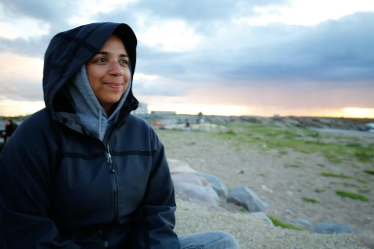Ms. Silva enjoys a final sunset along Hudson Bay.