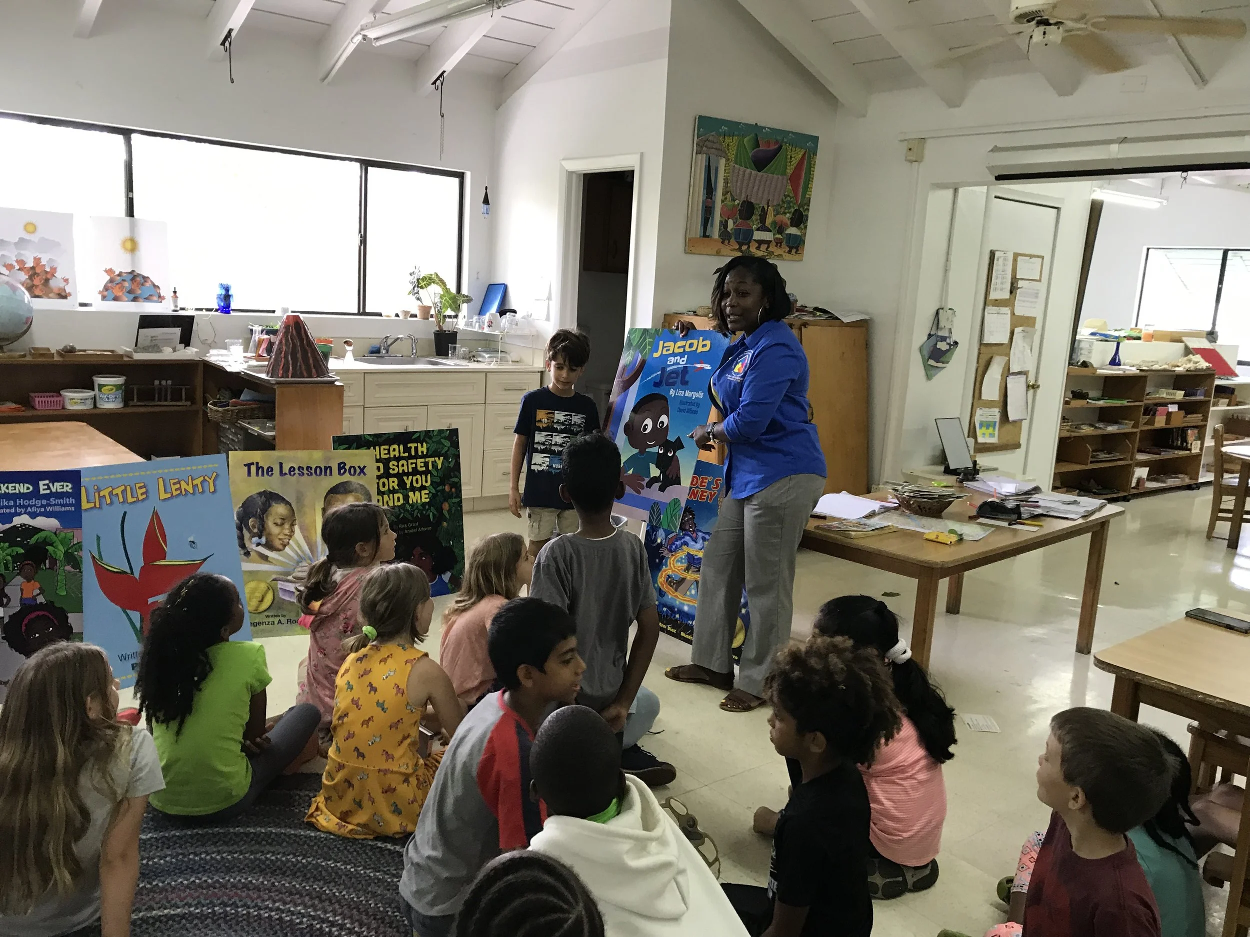 Jacob helping to introduce students to the Governor’s Summer Reading Program. One of the featured books is jacob and Jet, written by his mother Liza Margolis.