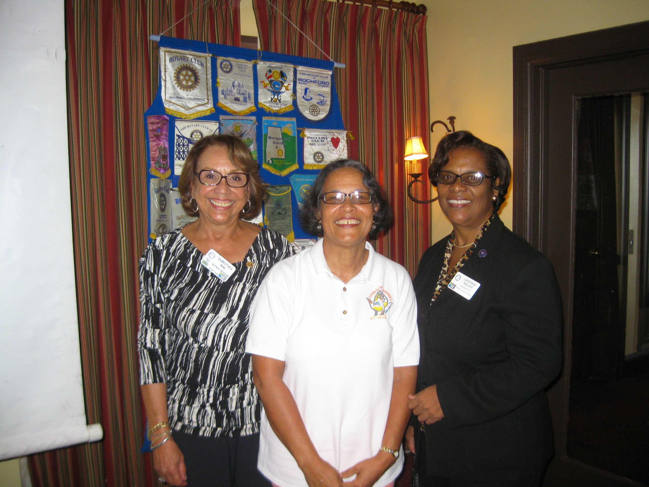 Pam Burnside (centre) with incoming Rotary President Dorothea Rae (left) and Rotarian Laverne at the presentation