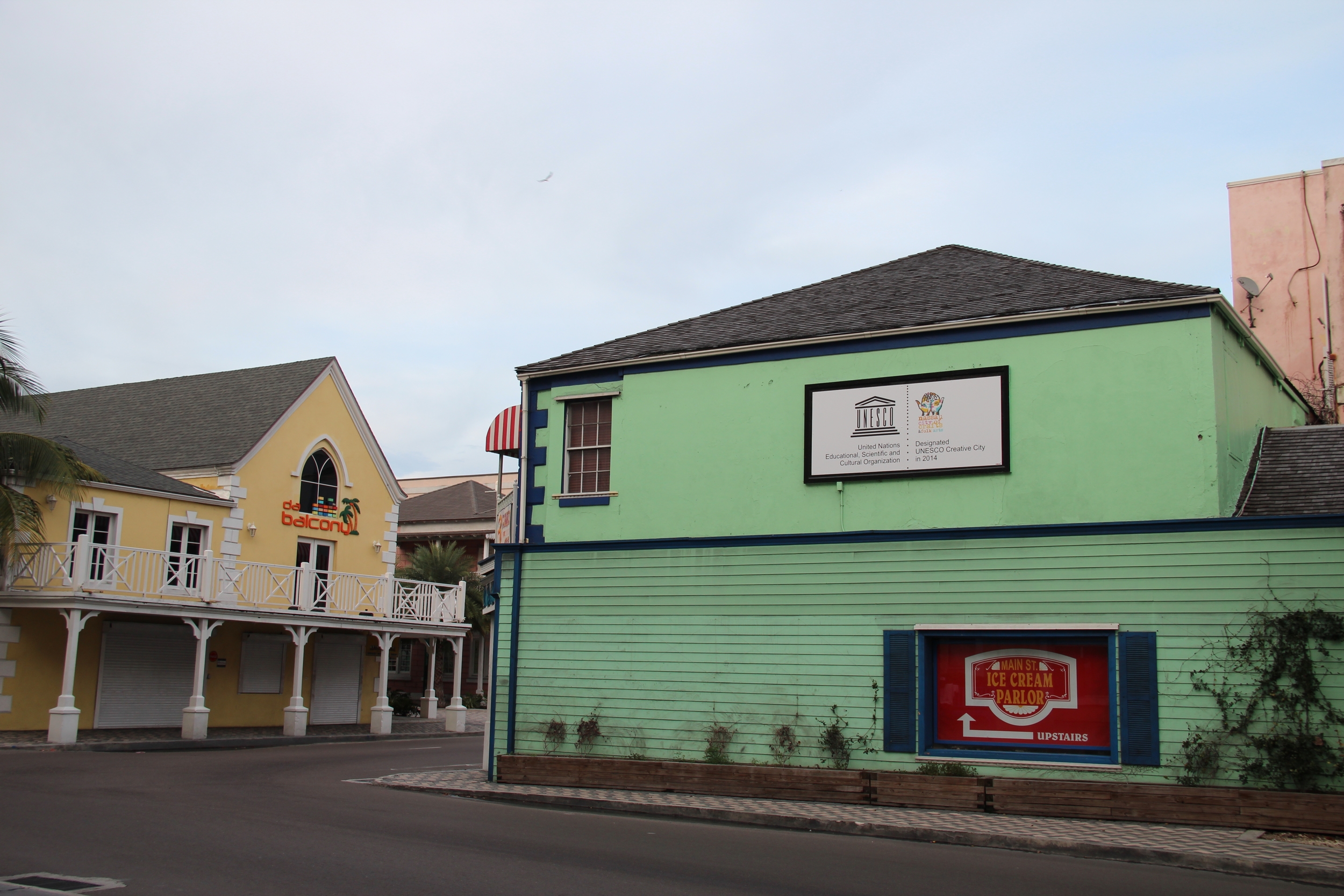 The UNESCO Creative Cities banner proudly displayed at the entrance of Downtown Bay Street in the City of Nassau, Bahamas. Photograph by Rosemary C. Hanna