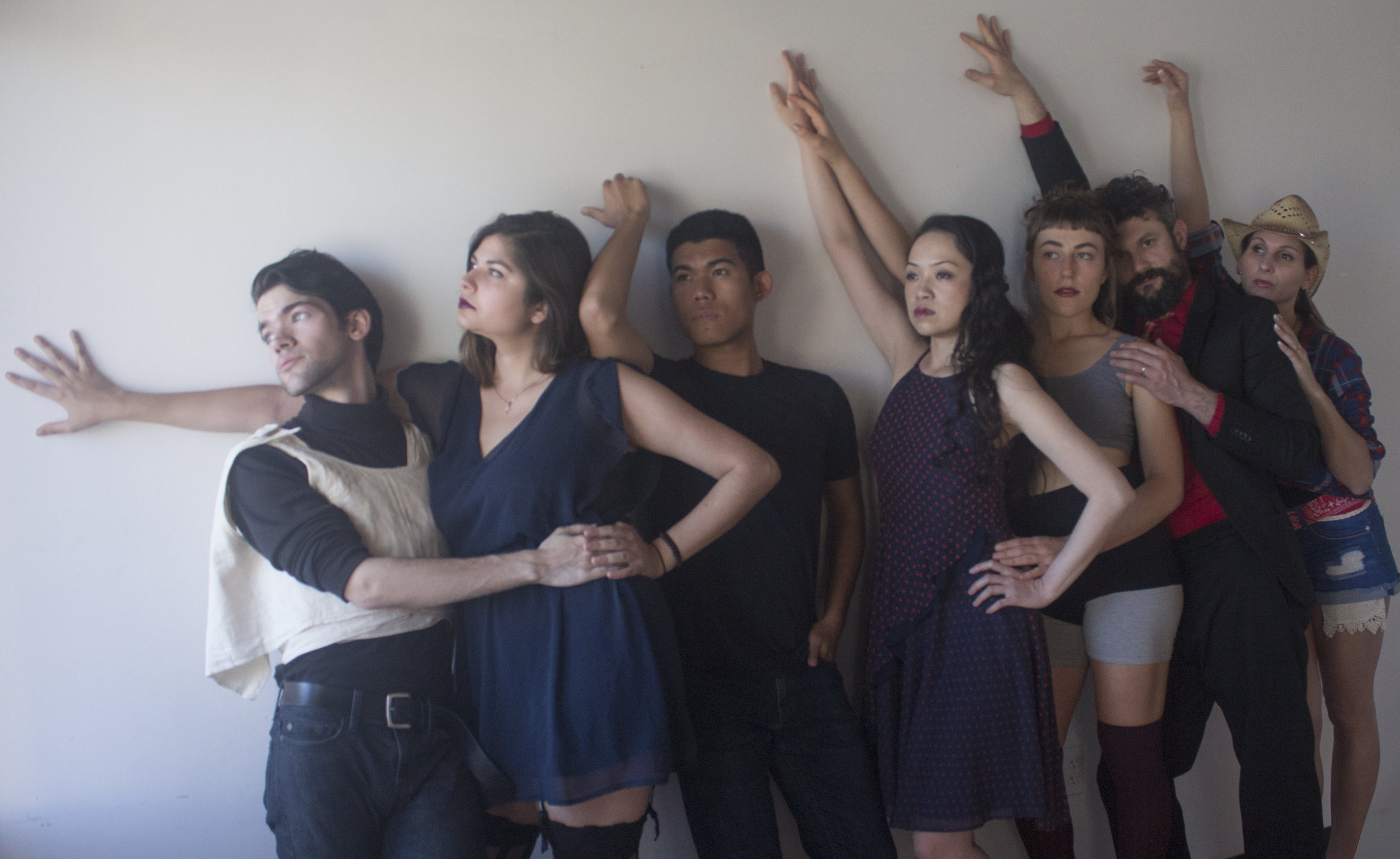 QC. cast arms up.jpg