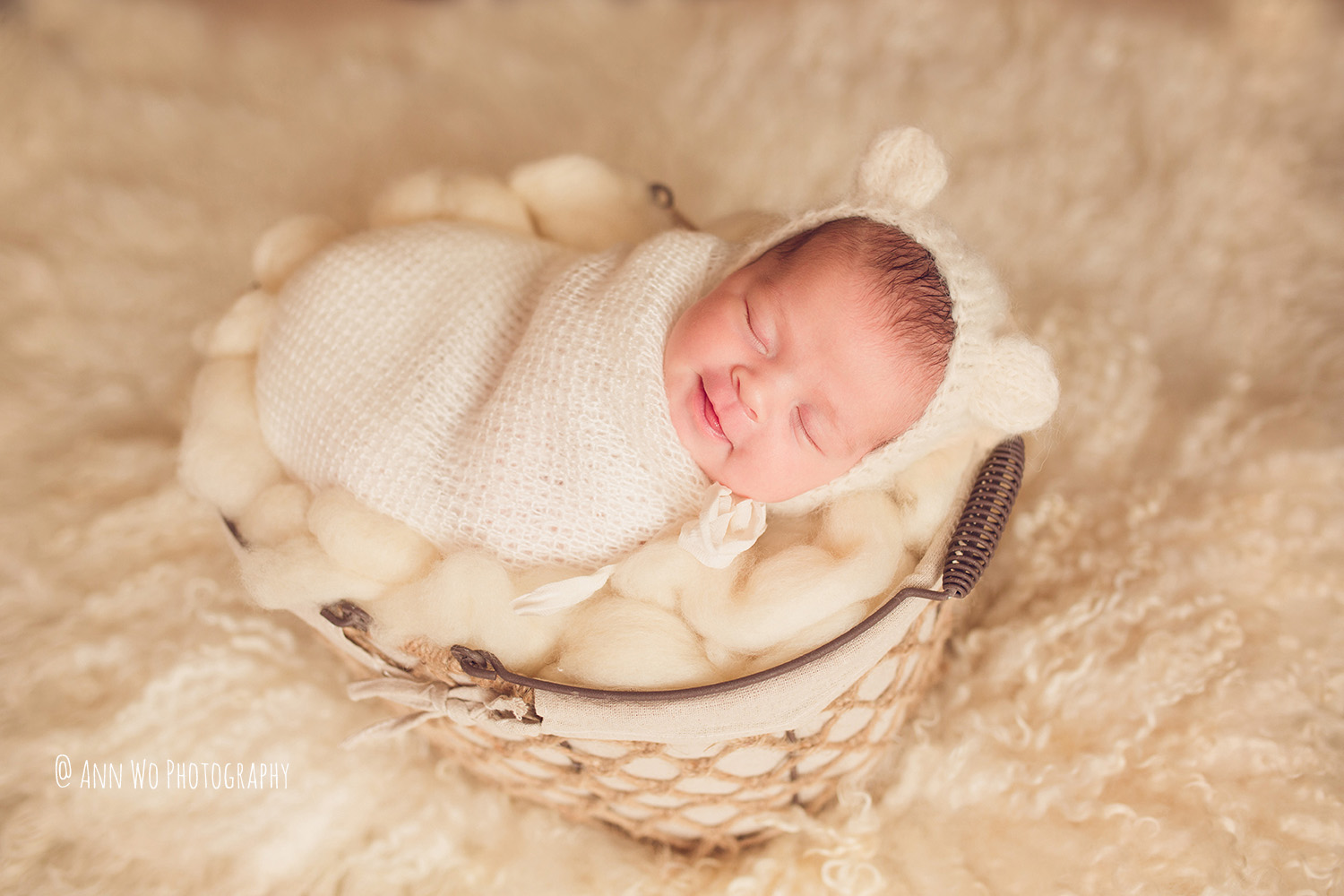 newborn photography training cream set up smiling baby by Ann Wo in London