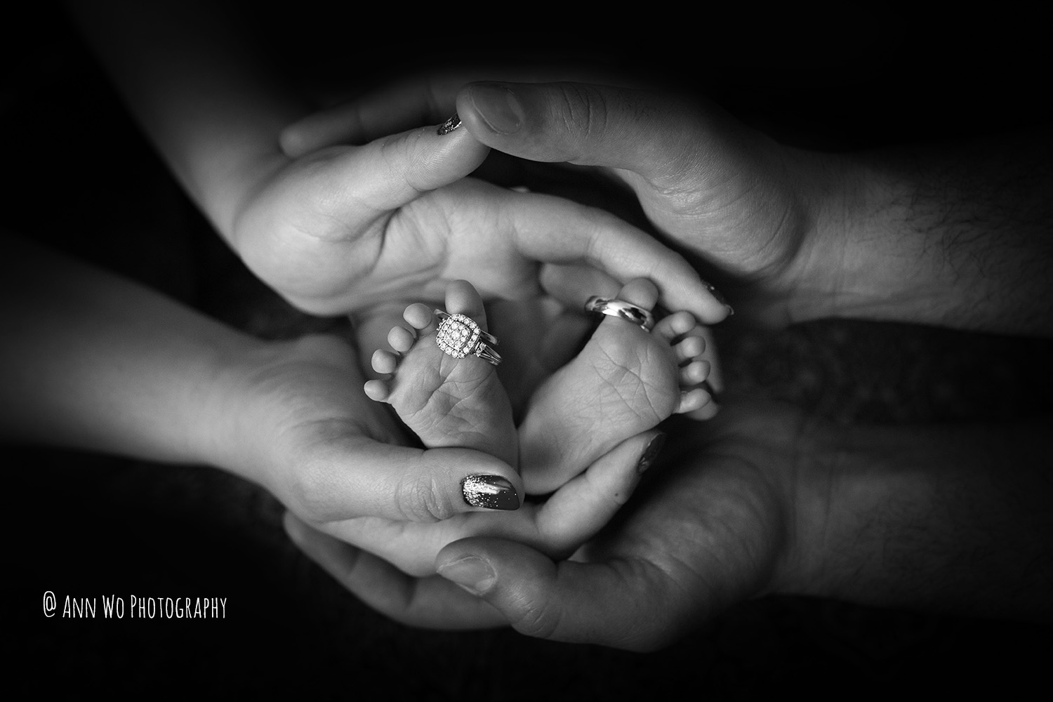newborn baby feet with wedding rings - London Ann Wo photography