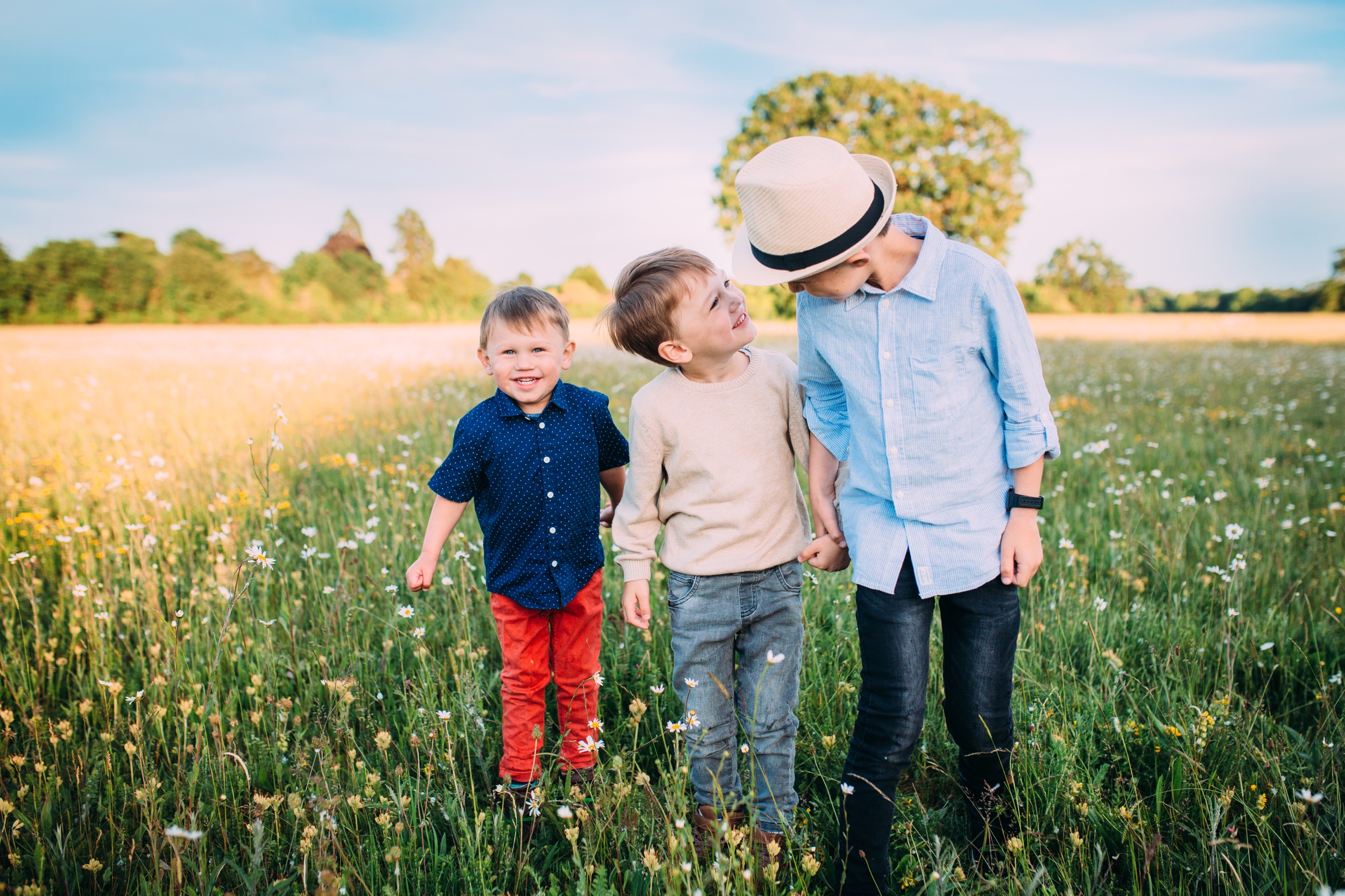 Three brothers in the field sunset family photography Ann Wo UK