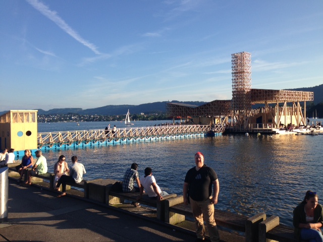 Here is John enjoying a trolley stop at the postcard-perfect lake in downtown Zurich. 