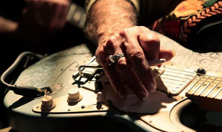 Aldoush Guitar Hand.jpg