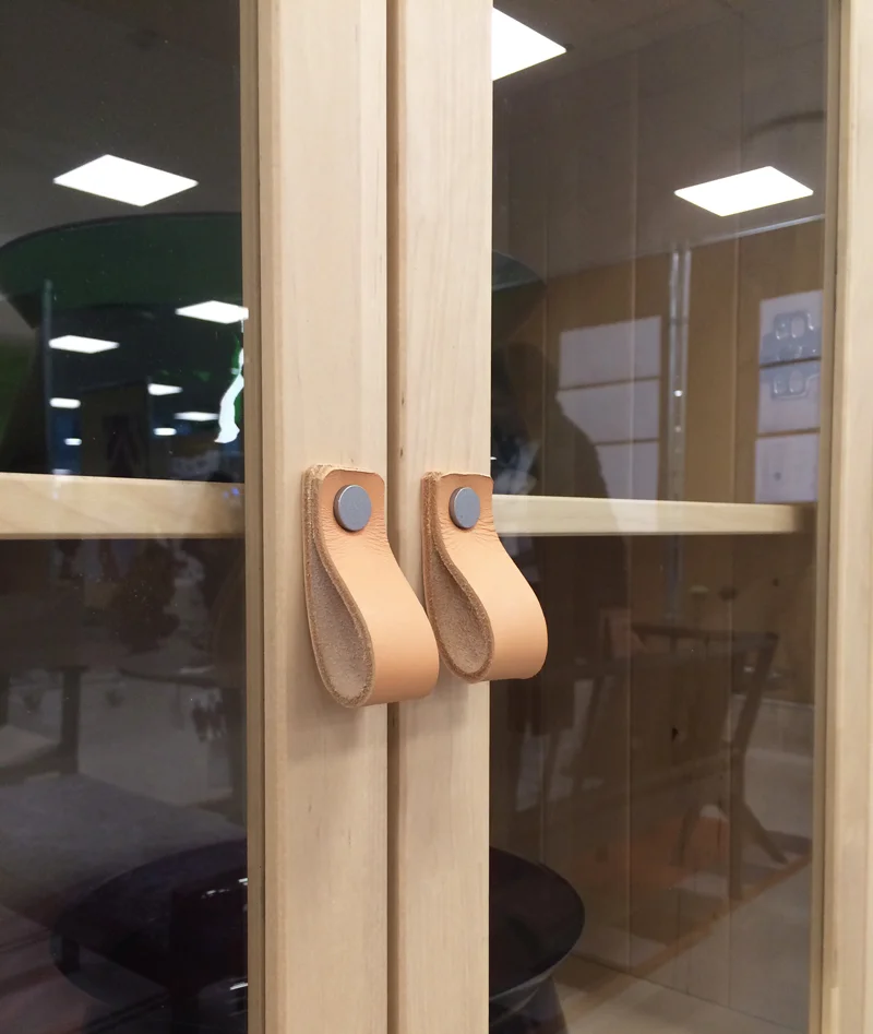 Leather pull tabs seemed to have made their way to some new pieces of IKEA furniture.