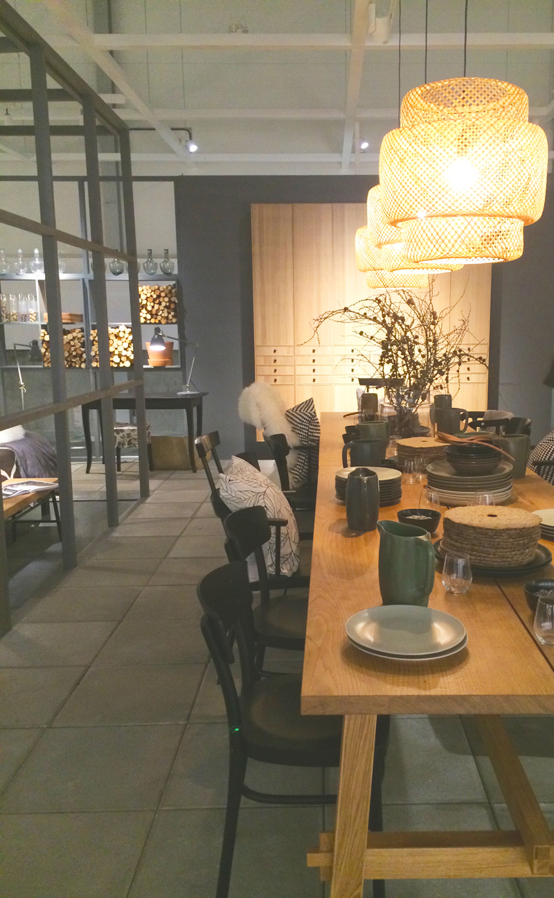 In the adjoining dining room, Ilse Crawford's new products were on display. The wicker light fixtures, pitchers and plates are all part of her collaboration with IKEA. 