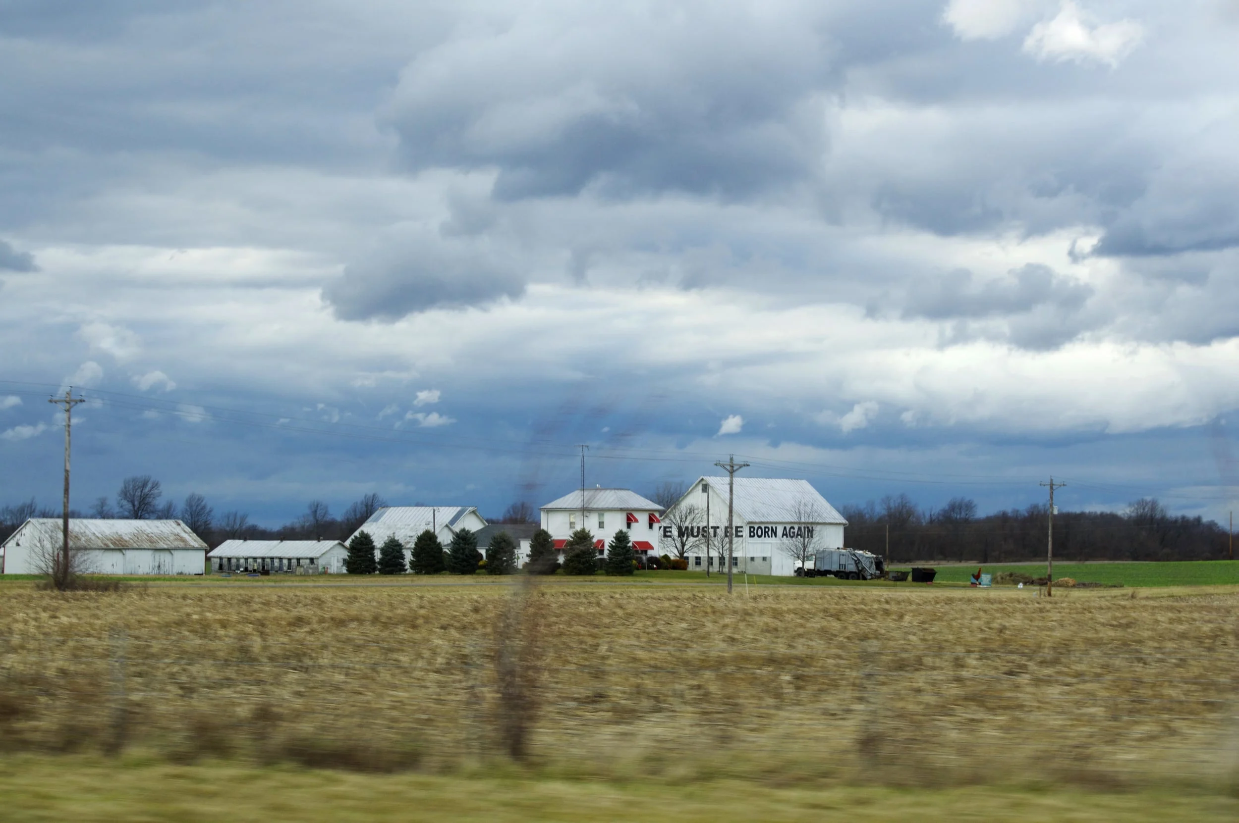 Theres a Garbage Truck in there driveway 