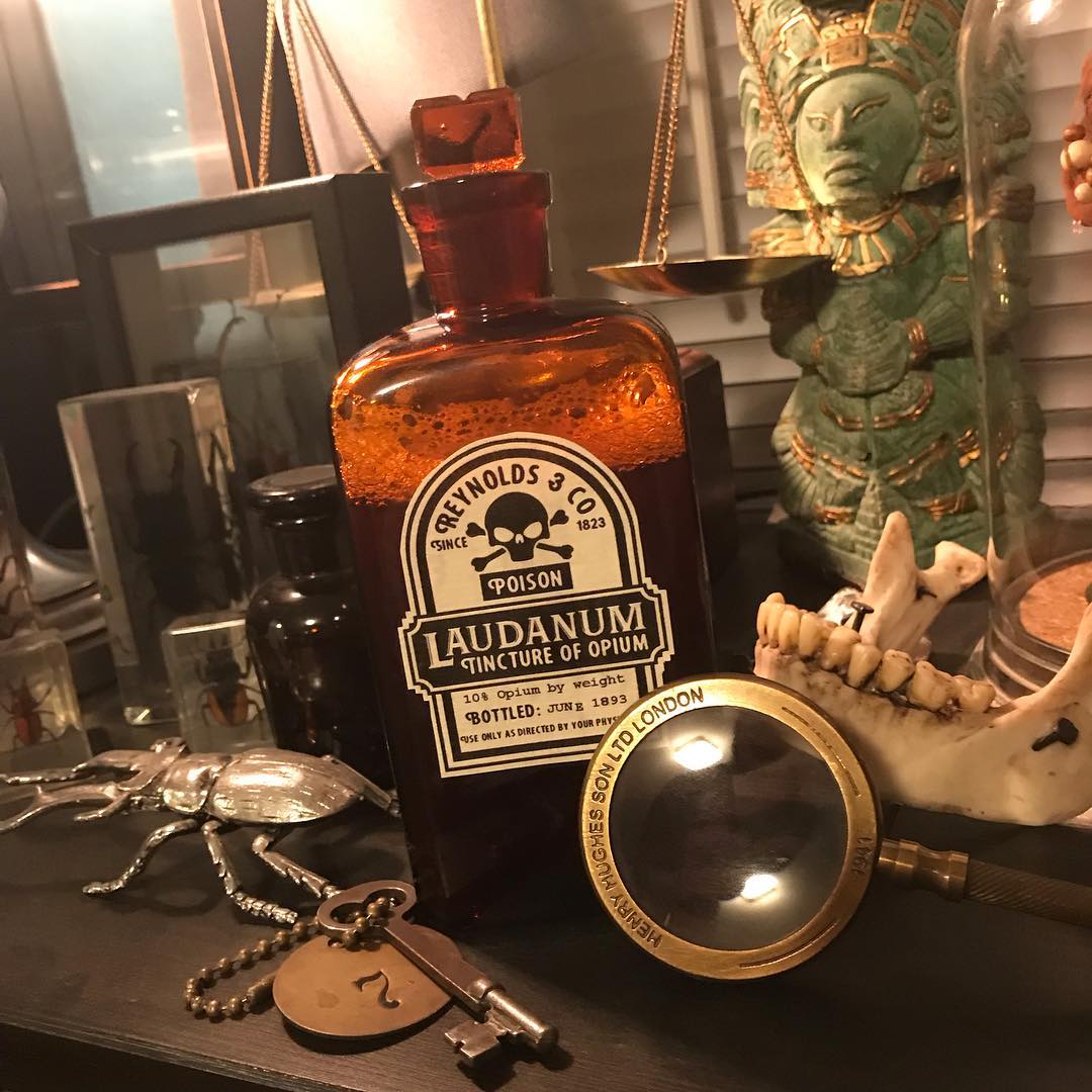 Victorian laudanum bottle label and historically inspired graphic props by Rushing's Rarities