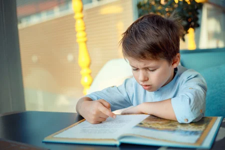 child finding it hard to read.jpg