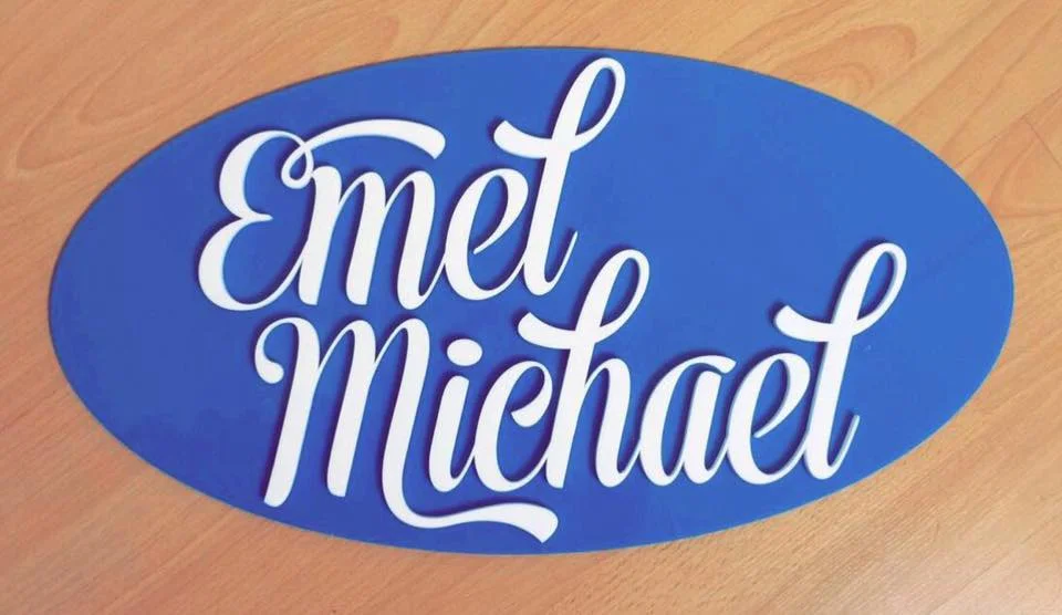 emel sign with imoji - pain.jpg