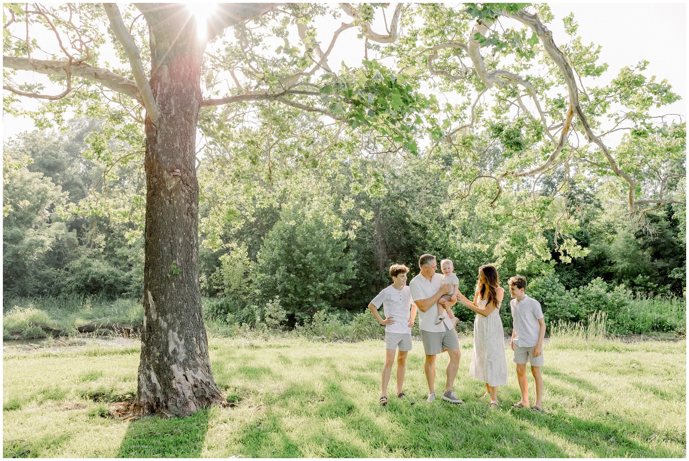 family-of-five-under-tree.jpg