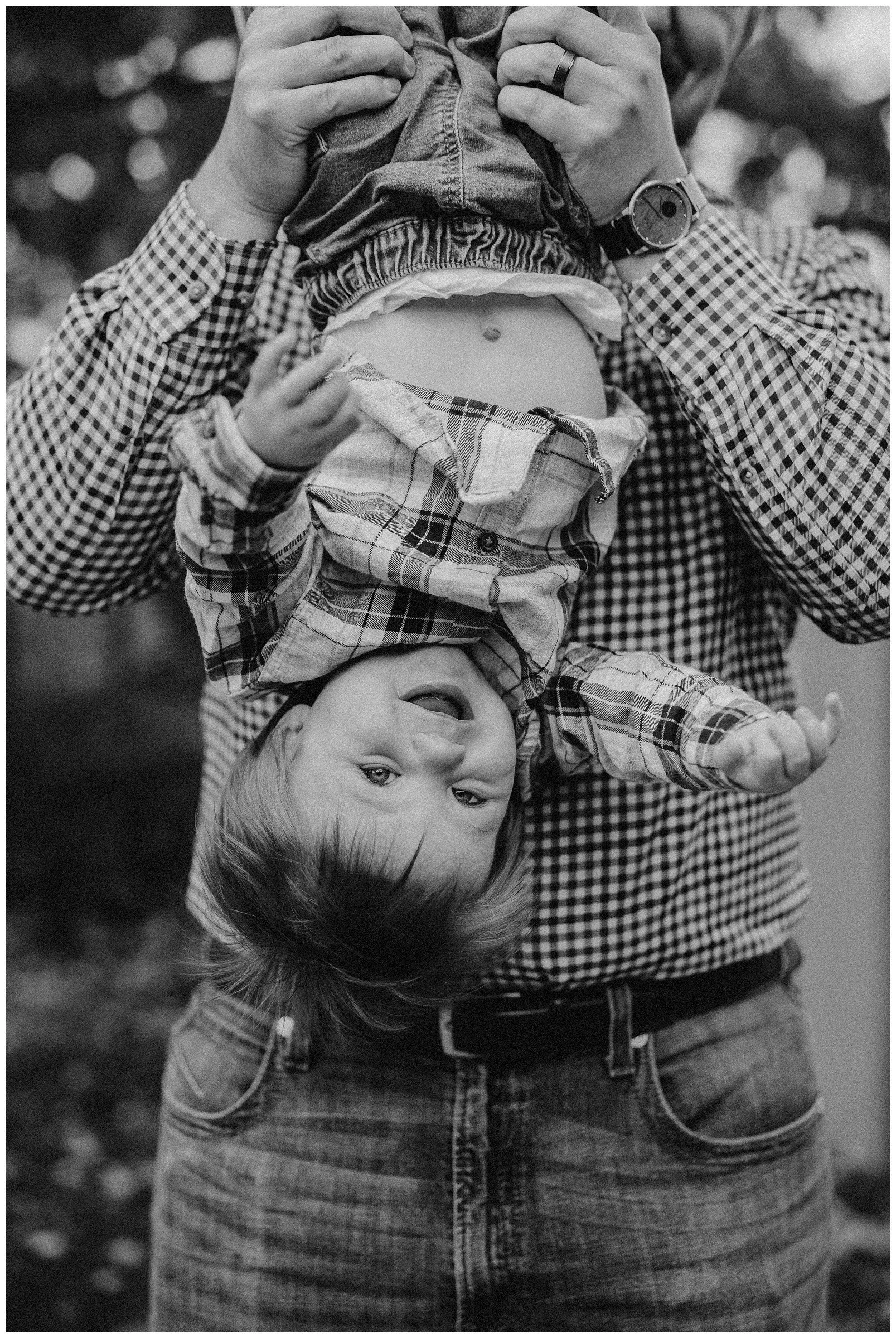 dad-holding-toddler-upside-down.jpg
