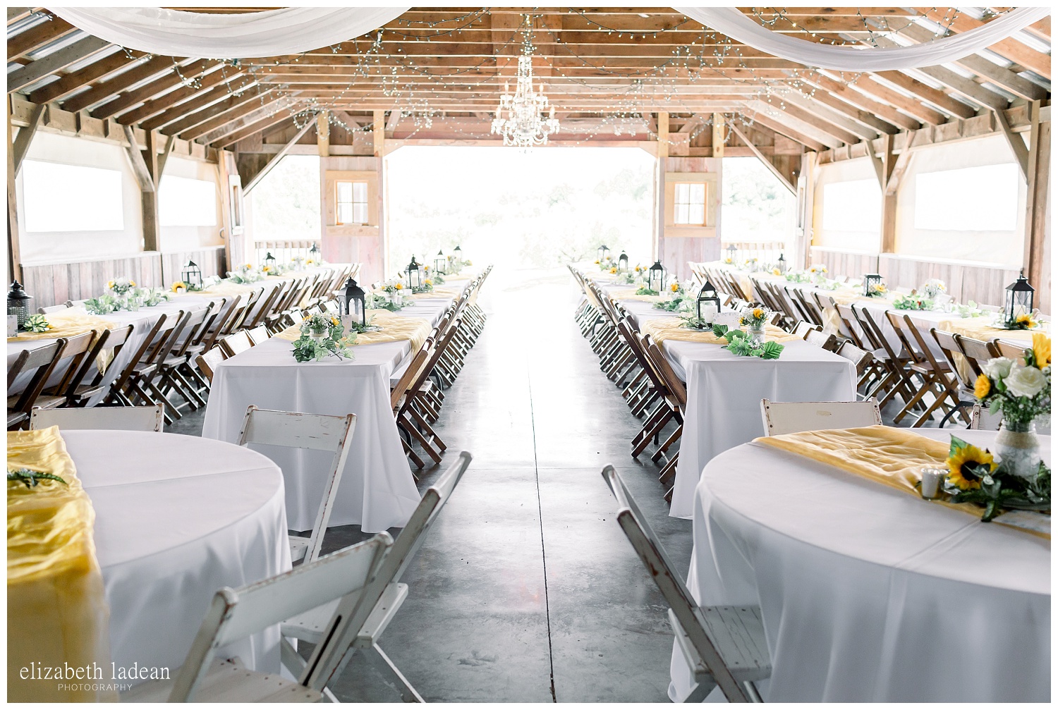  Weston Red Barn Farm wedding reception with farm tables 