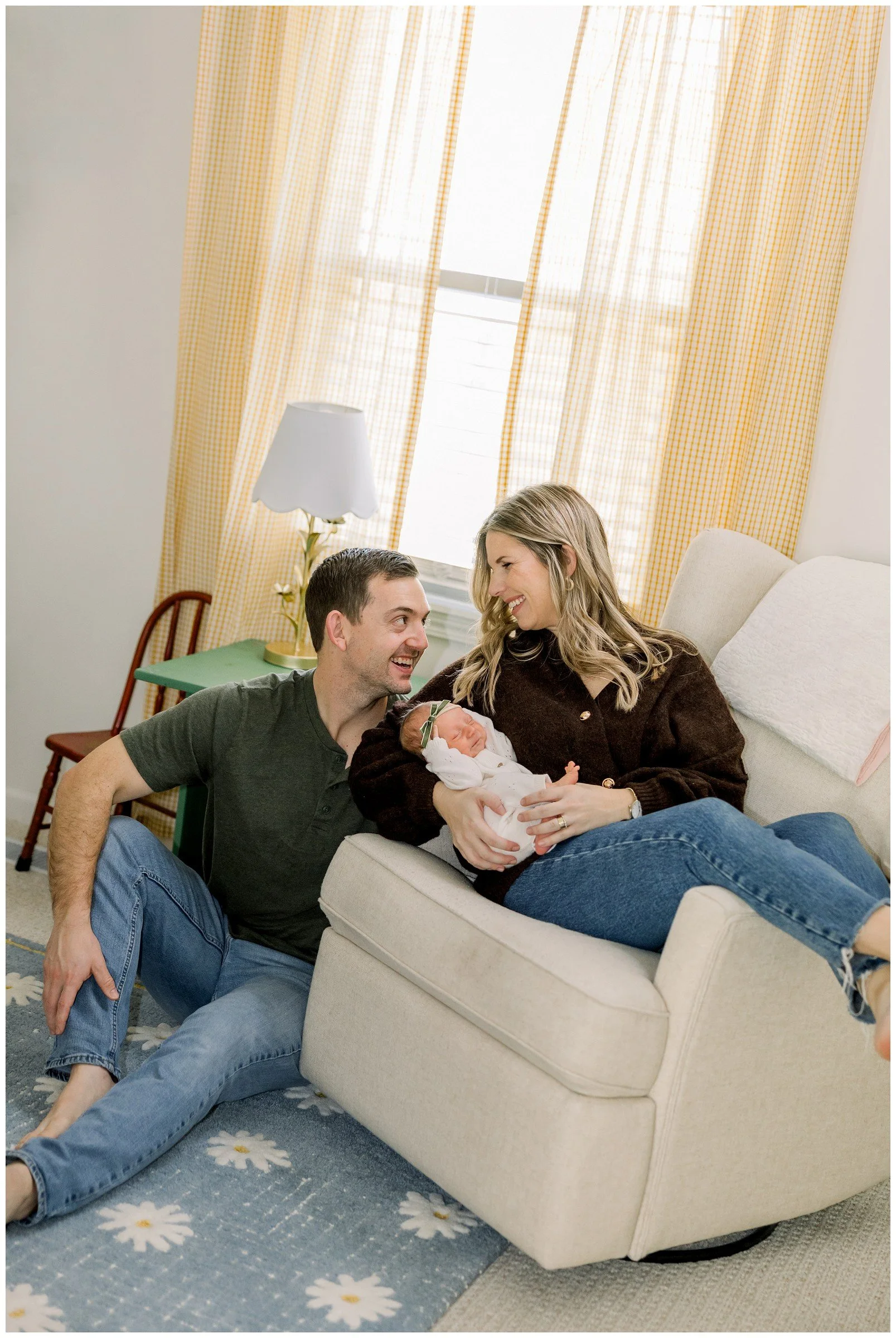 newborn-with-parents-in-nursery.jpg
