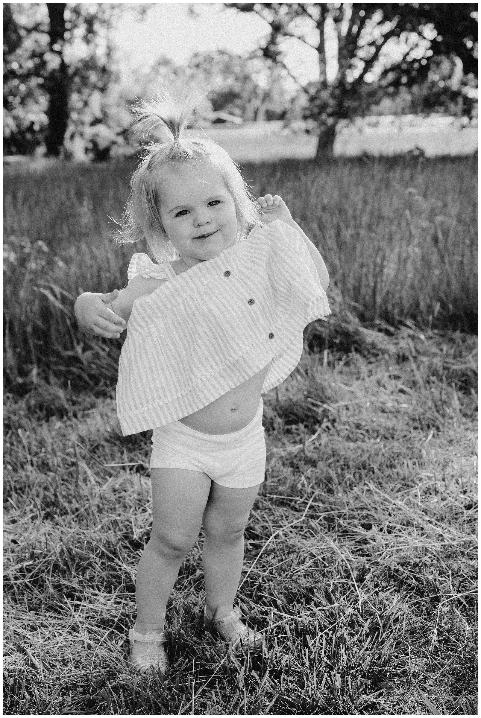 little-girl-playing-in-field.jpg