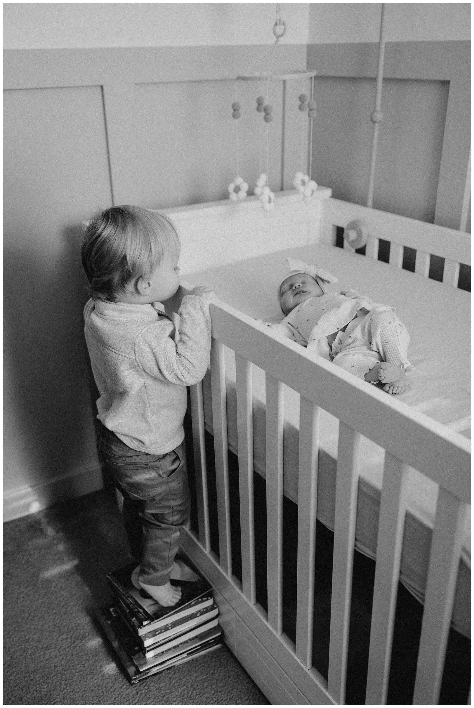 big-brother-looking-at-baby-sister.jpg