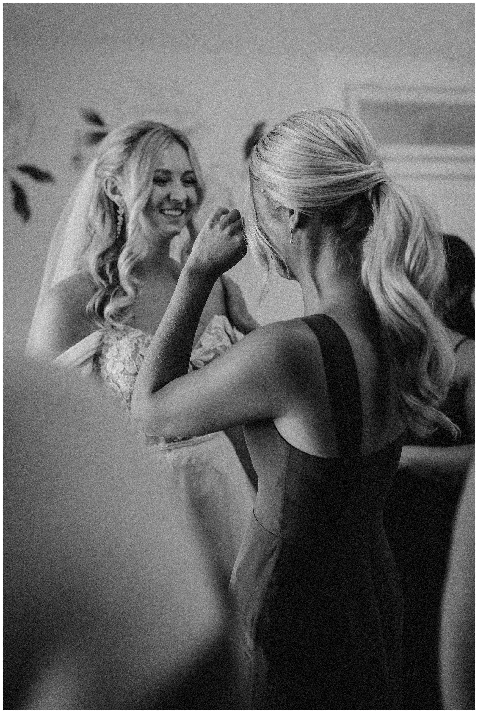 sister-crying-with-bride-wedding-hawthorne-house.JPG