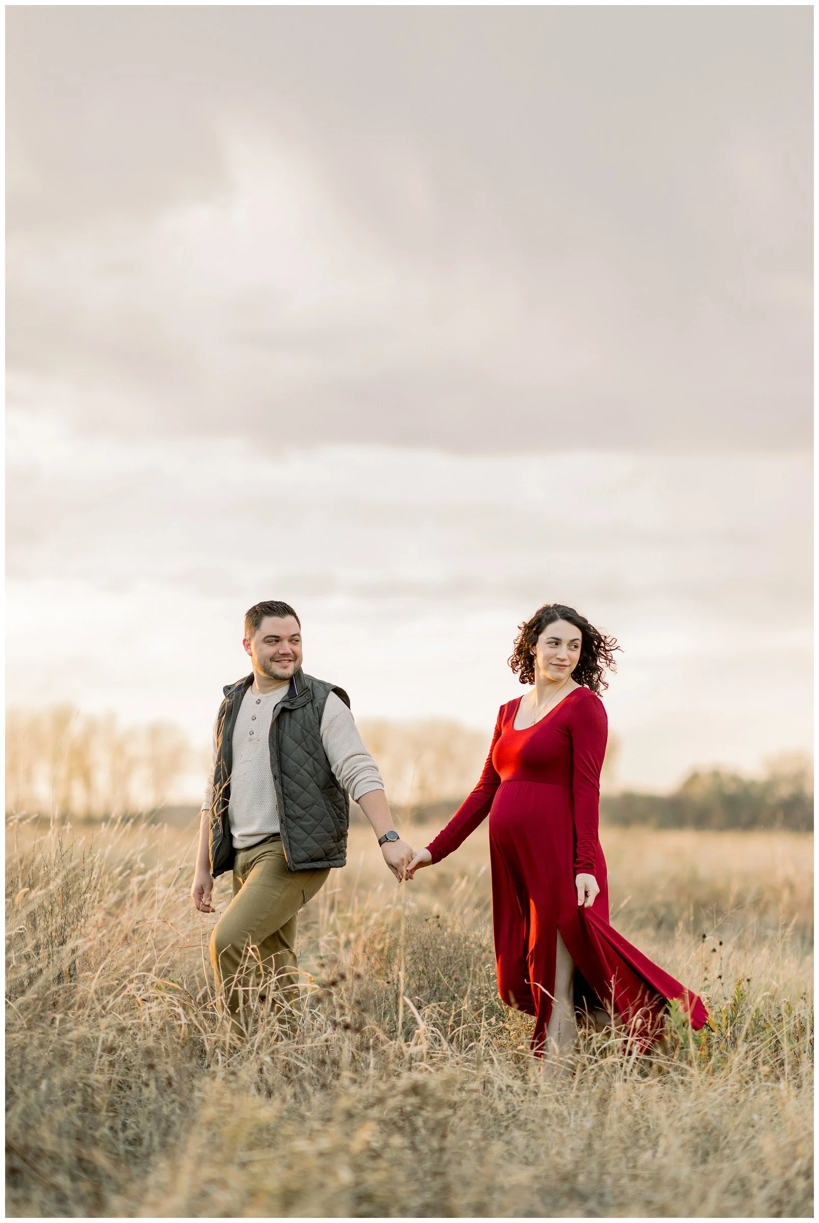 husband-wife-pregnancy-fall-field.jpg
