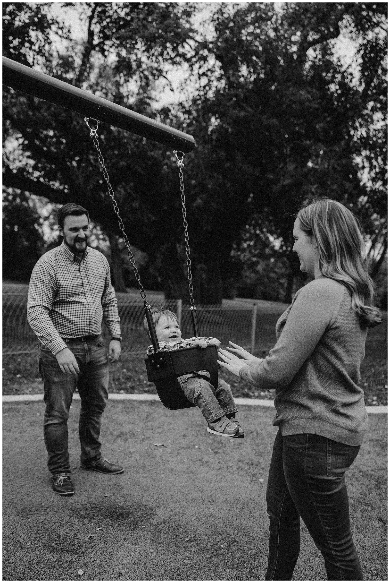parents-swinging-toddler-park.jpg