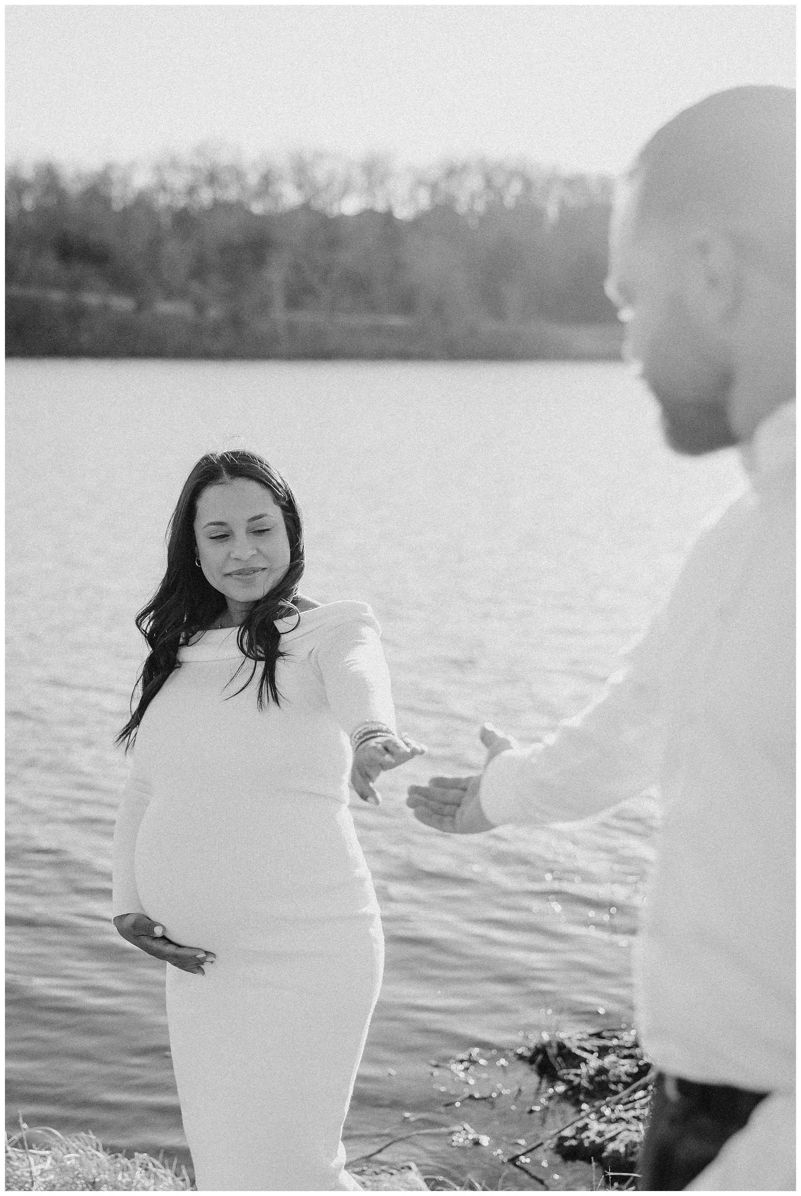 pregnant-wife-holding-hand-husband.jpg