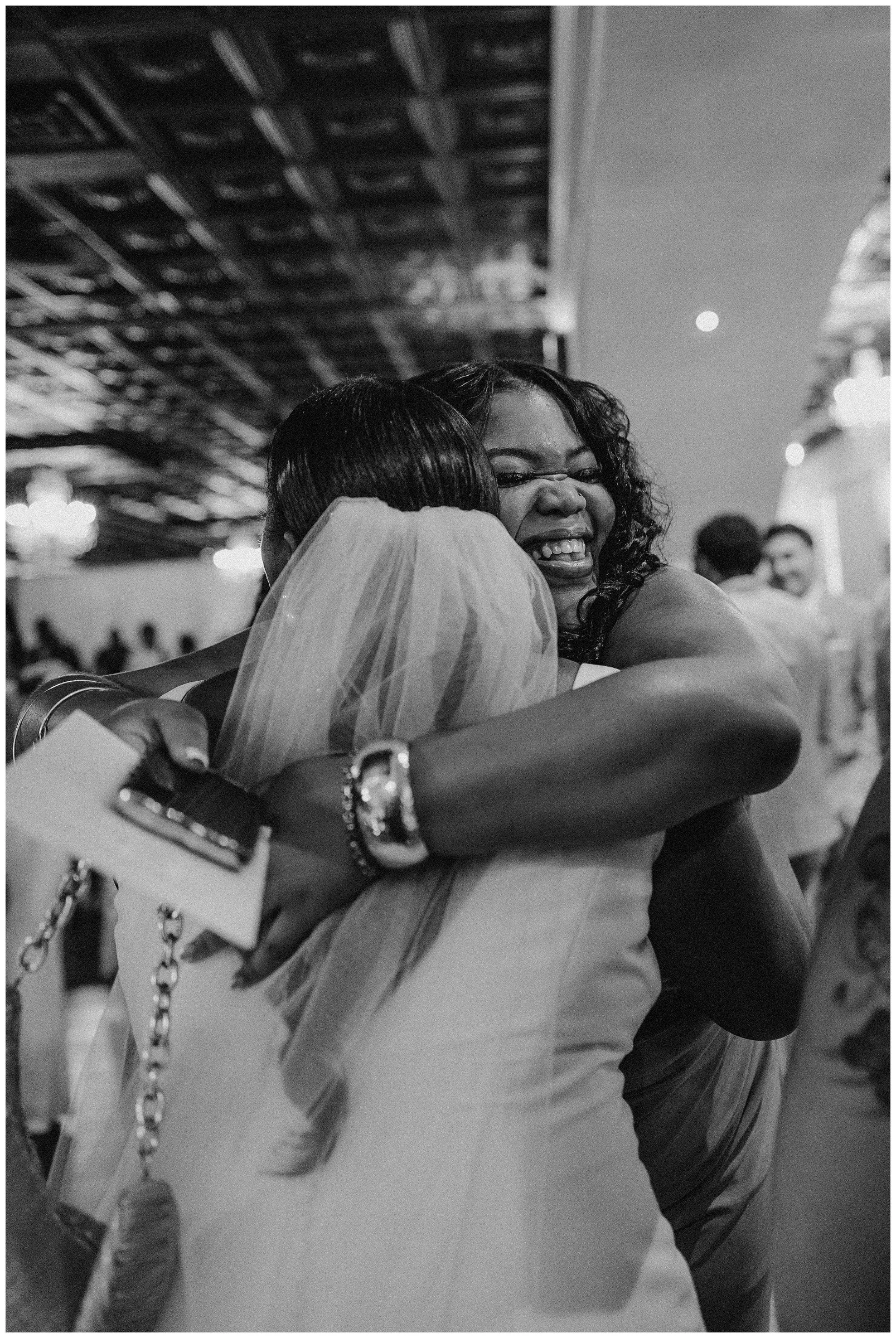 bride-hugging-guest-wedding-midwest.JPG