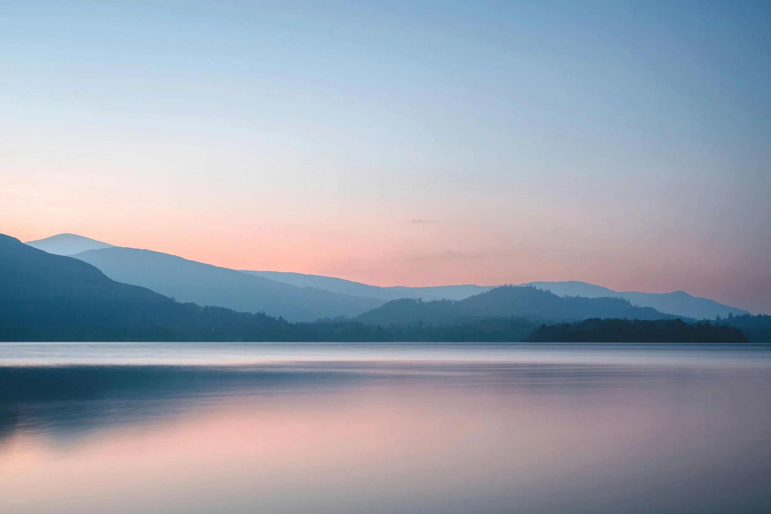 Dreamlike lake and soft glowing light suggesting healing, expansion, and the deeper journey of Eating Wisdom.