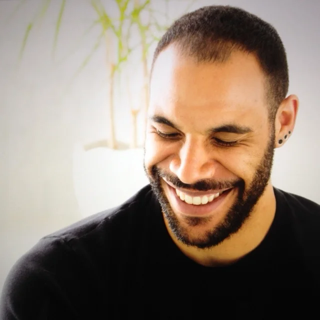Does this look like a dangerous, violent bad guy? I didn't think so. How can you not love a man who smiles like this?
