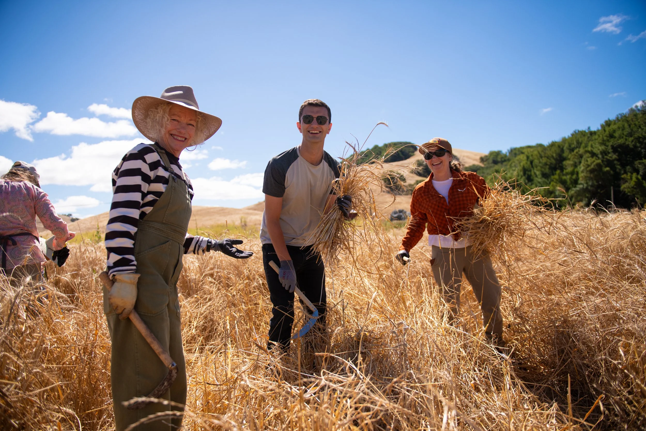 Harvest smiles. Left to right: Chiquita Woodard, Ethan Stickler and ADD NAME