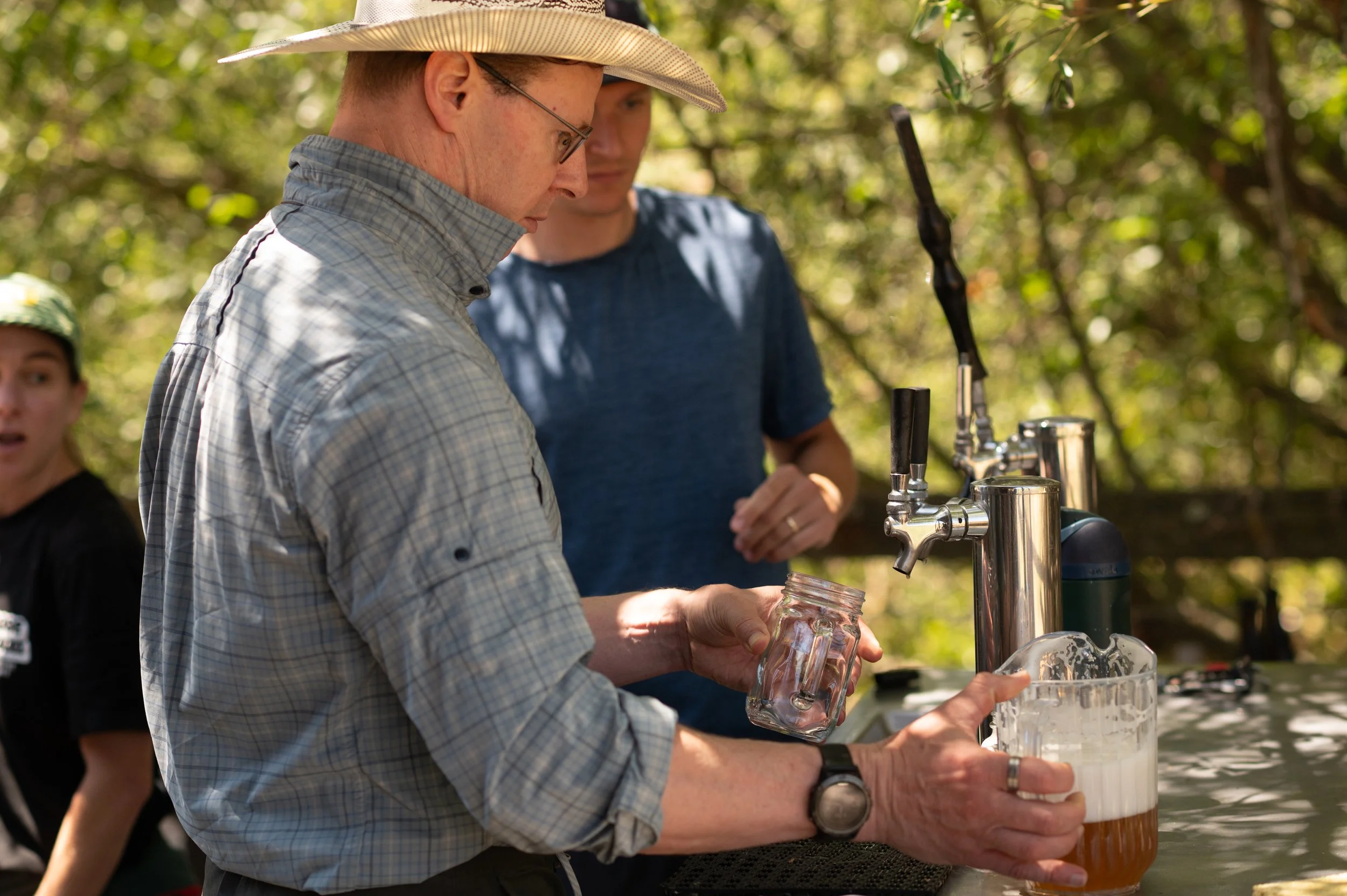 Award-winning home brewer Ken Clemmer pouring his handcrafted Honoré Hourani beer.