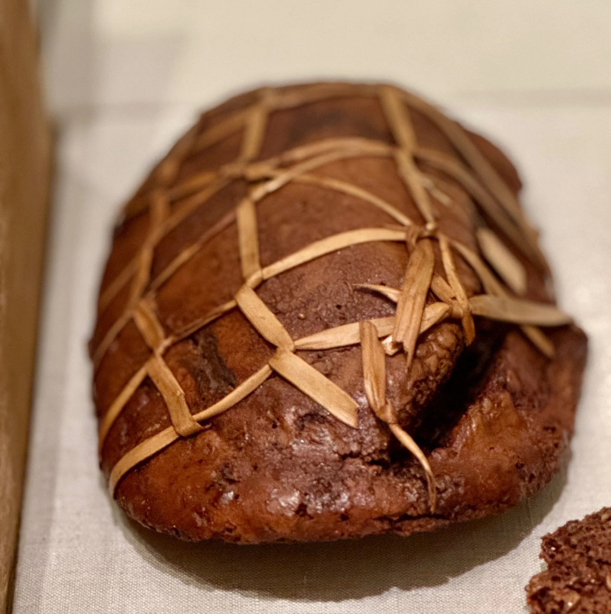 Five thousand years old. Carefully preserved. Beautifully wrapped. And so completely familiar. Flour, water, salt — baked by human hands in a wood-fired oven. I could just imagine the baker standing there, doing exactly what we still do.