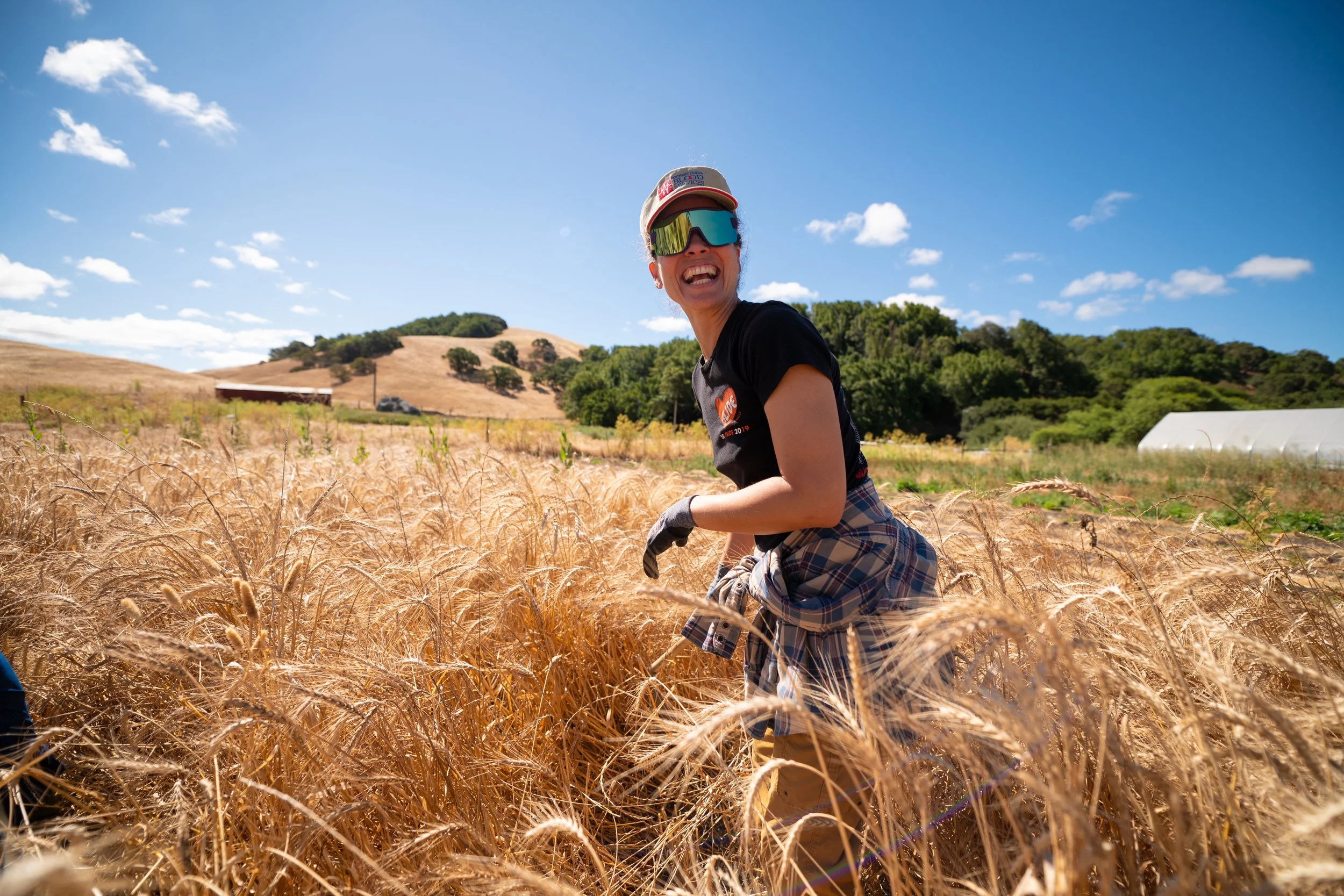 Harvest joy written all over Luisely's face as she celebrated a beautiful morning in the field
