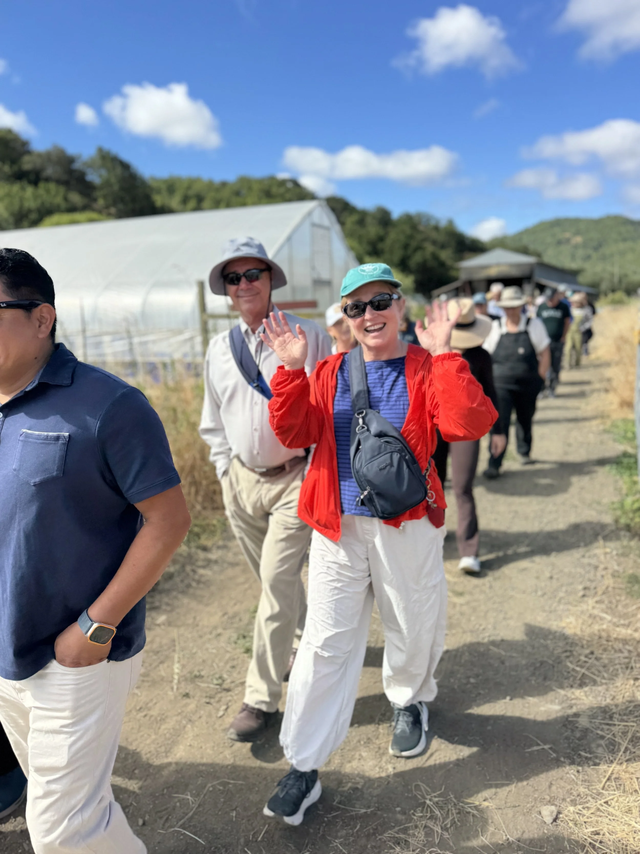 With the morning's welcome complete, it was time to harvest. Crop Adopt Partner Elise Bauer and Guy Mitchner. Photo Credit: Elizabeth DeRuff
