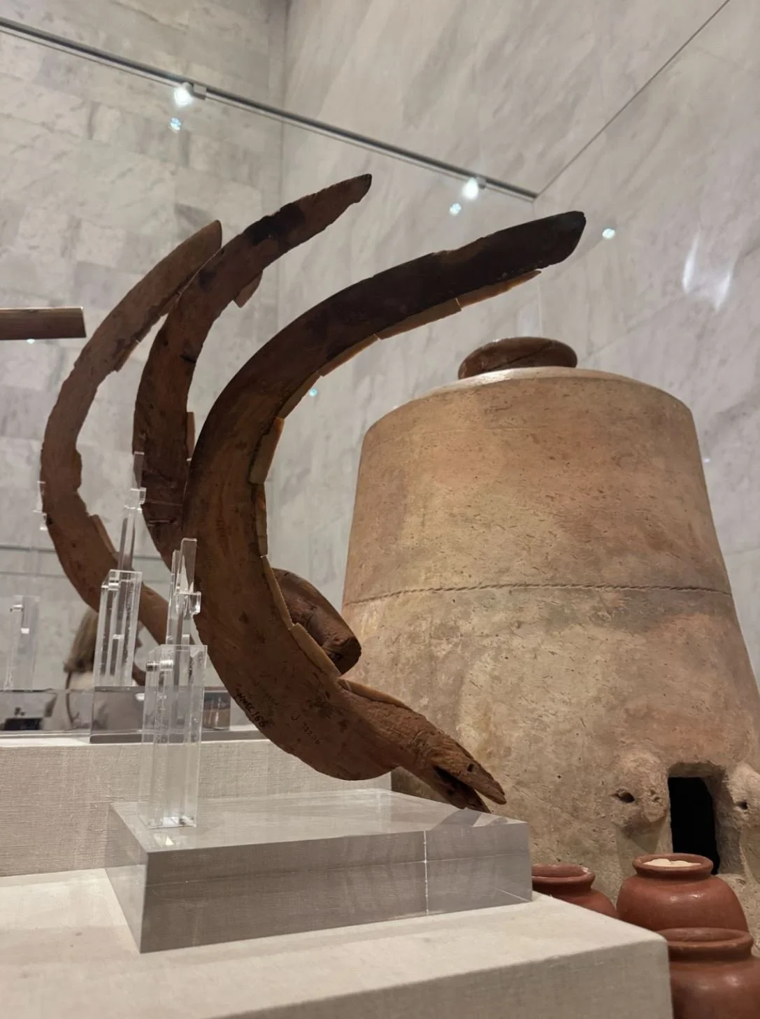 A 5,000 year old sickle used to harvest wheat––like the sickles we use in the fields at Honoré’s harvest day. This sickle had a carved wooden handle with carefully-shaped saw-tooth metal blades glued using resin or sap.