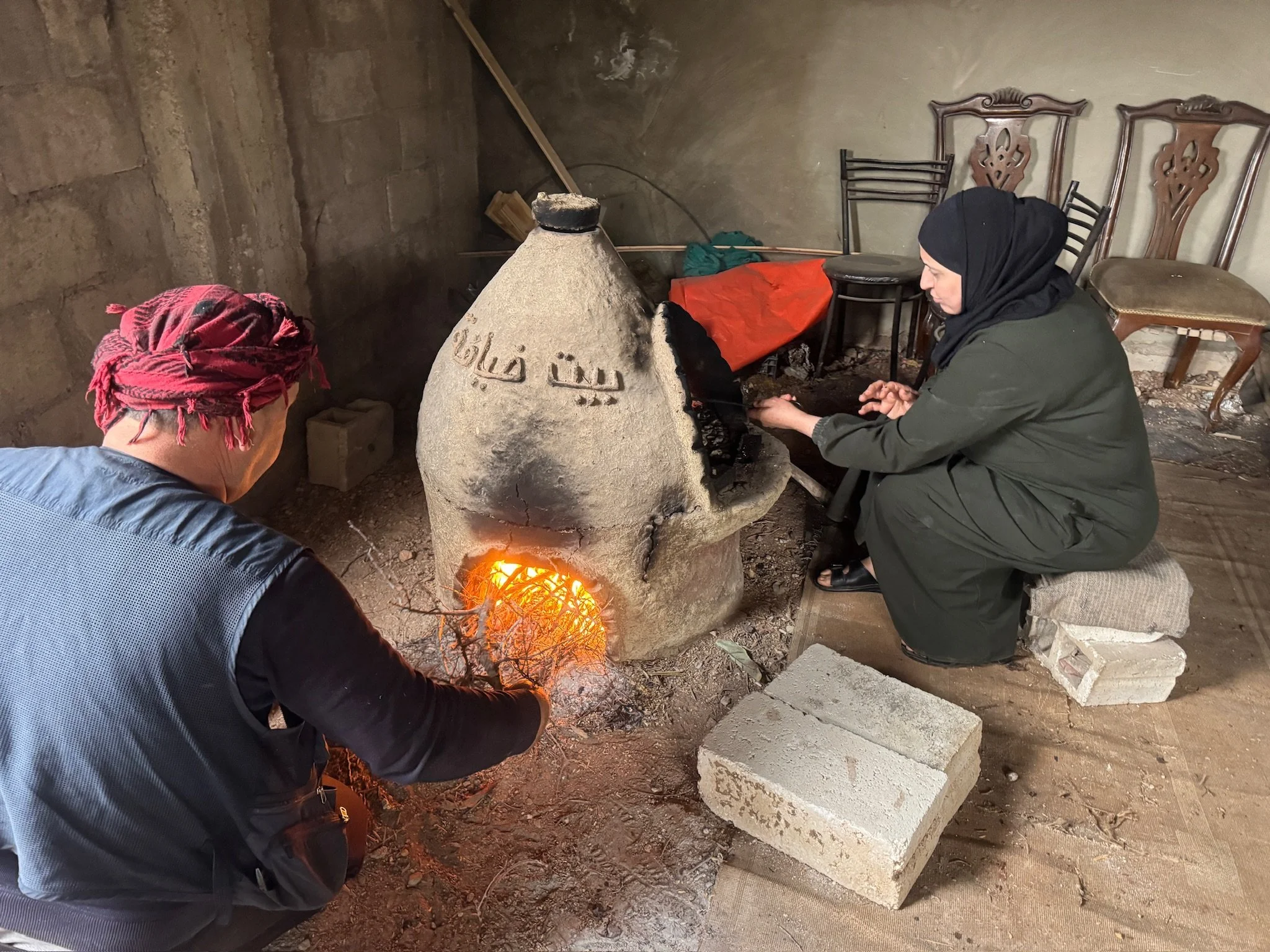 Baking in a Taboon oven is a shared act. One person tends the fire. The other watches the bread, which bakes in less than three minutes. It is attentive work—requiring presence, timing, and care.