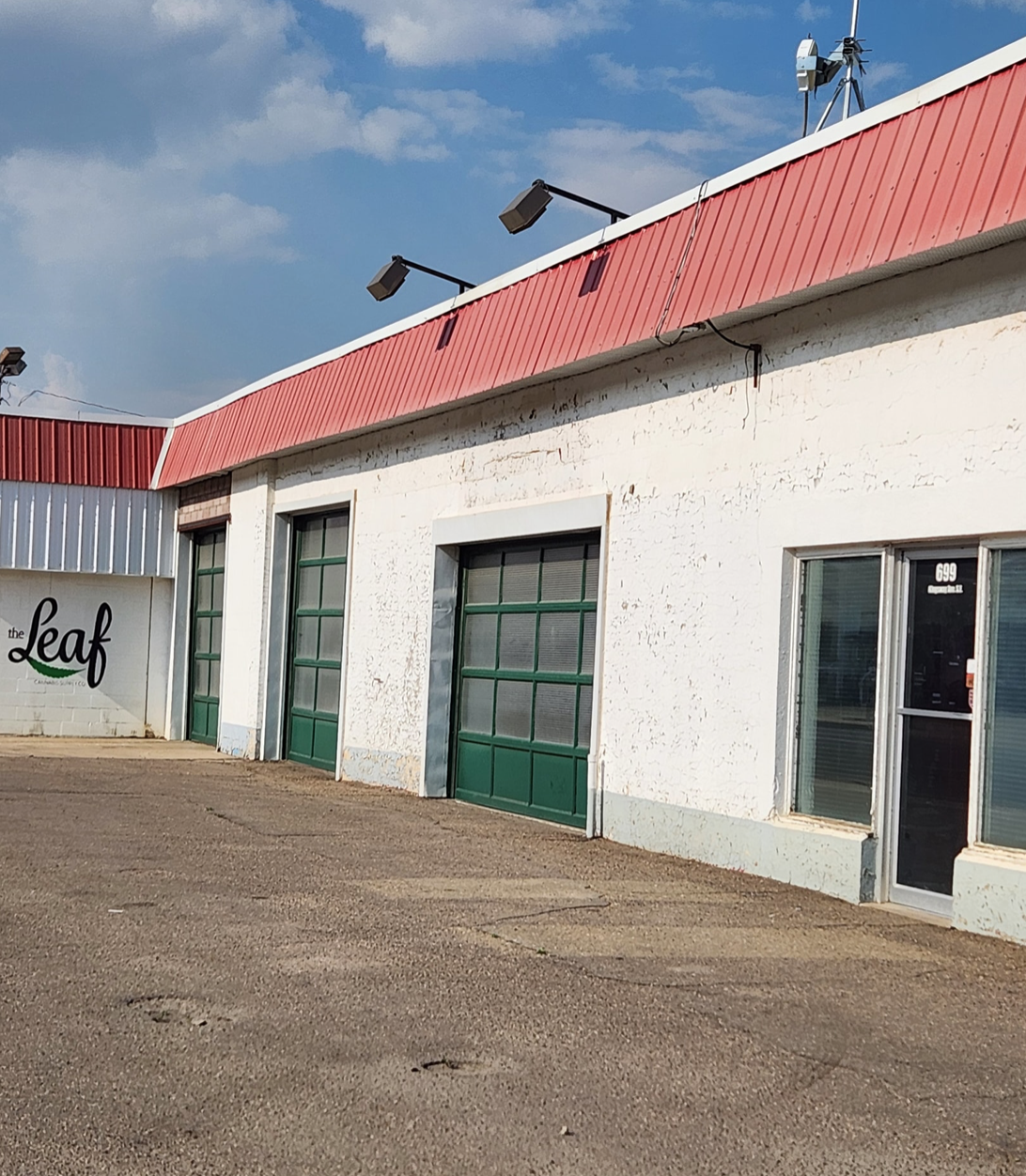  Unused auto service bays. Never likely to be used again. Nothing against the Leaf, but this property, like about half of Kingsway, is way underutilized. 