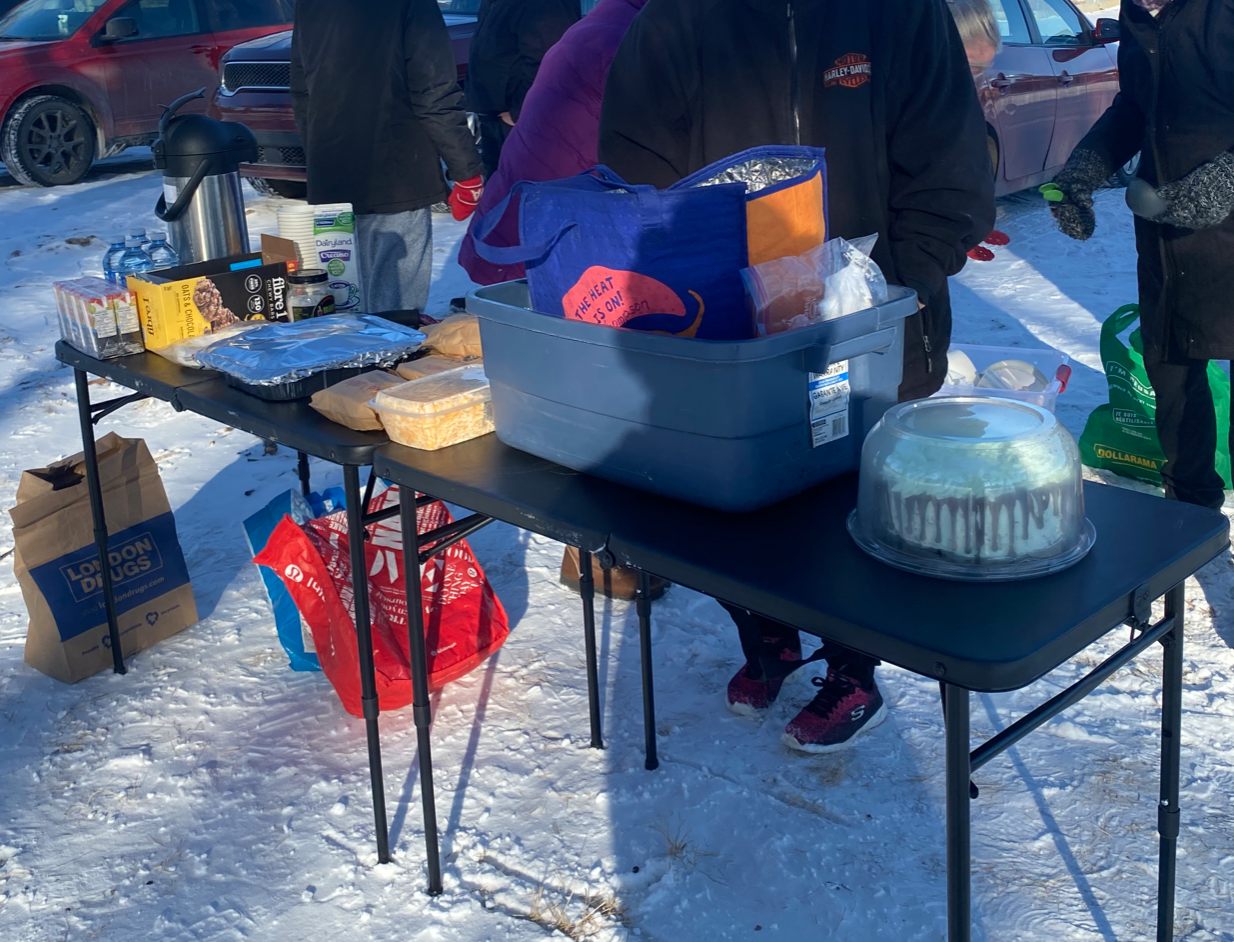 "Gittin' 'er Done": As City Hall Talks, Kookums Feed the Hungry