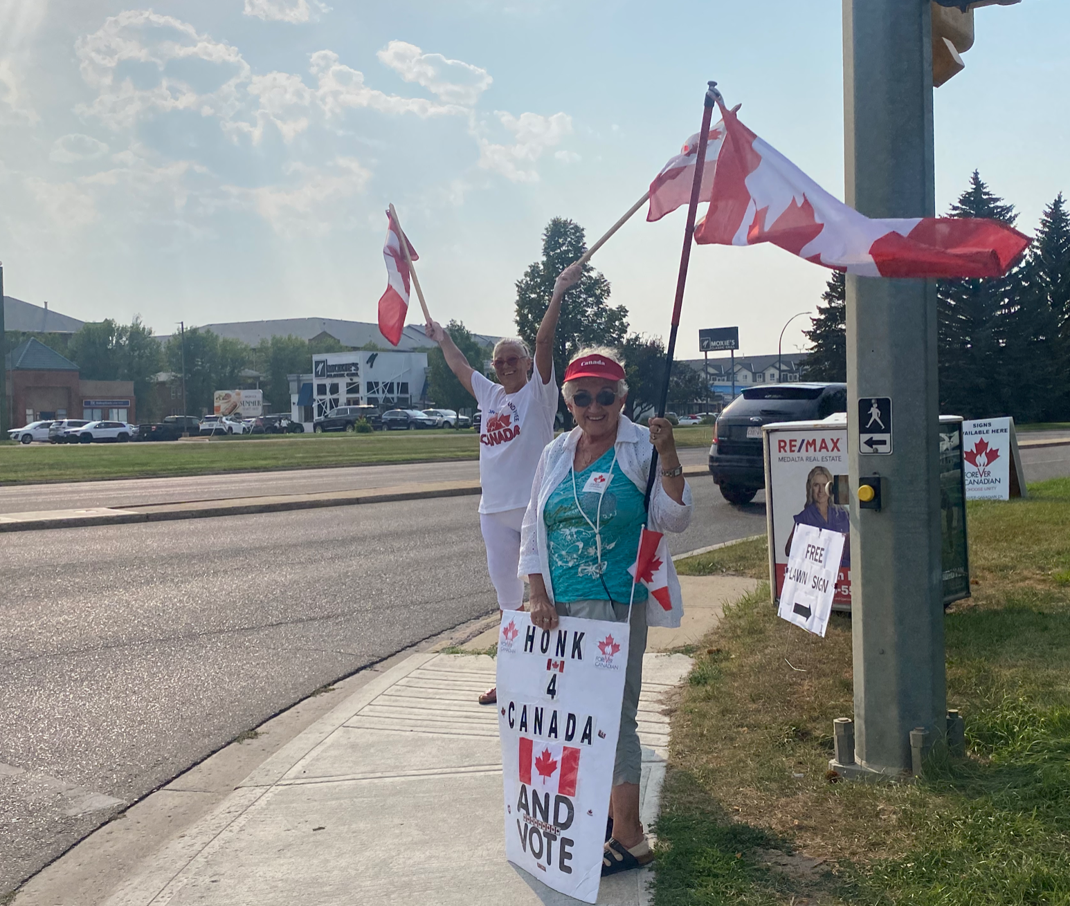 Lovely ladies waving flags