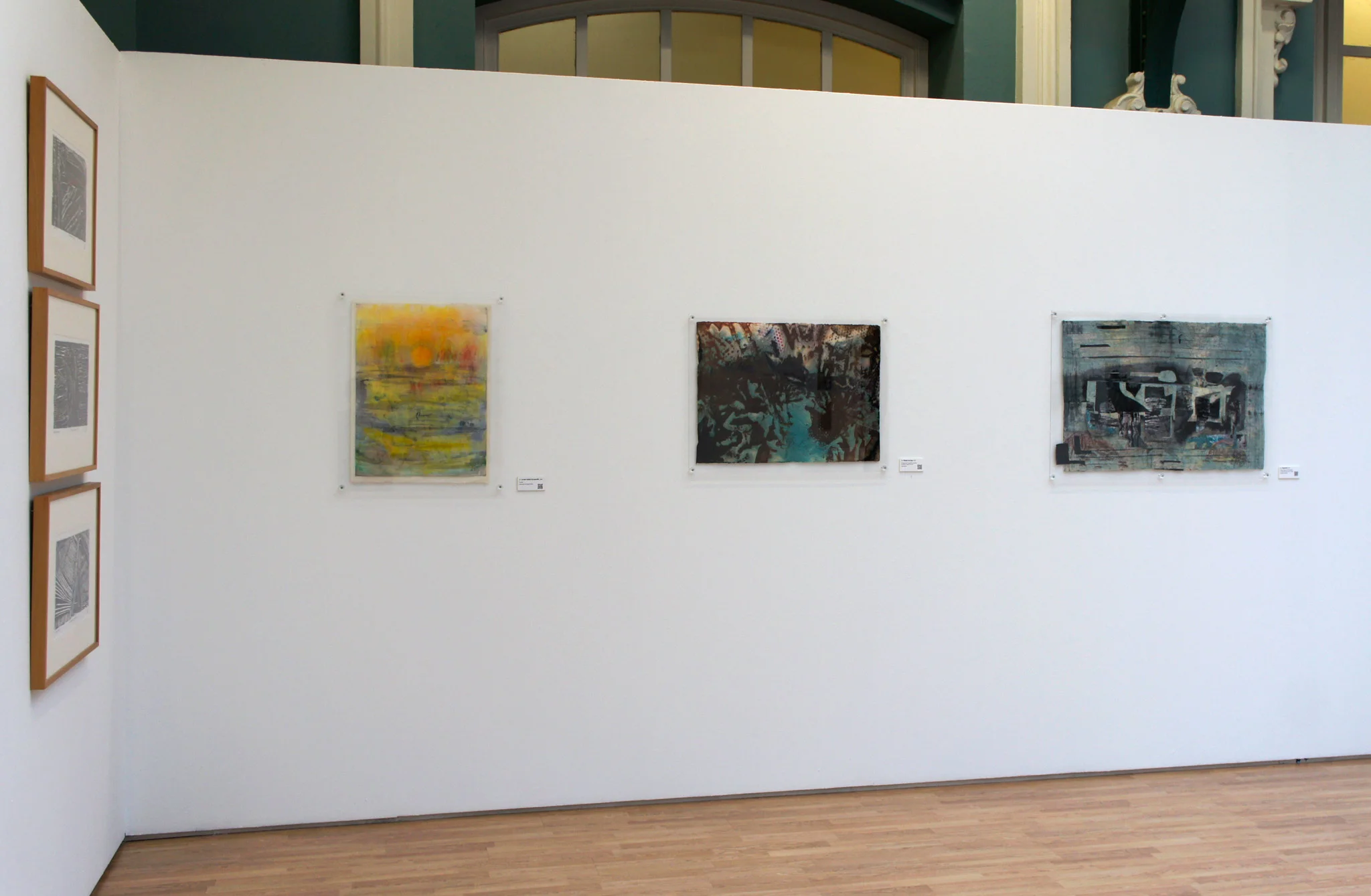 From left to right: La mar teñida de amarillo (2000), Bosque con lago (1997), Fragments (2003)
