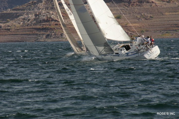 Photo credit for this one goes to Rose's Inc. I'm on the boat! Look at that rail in the water!