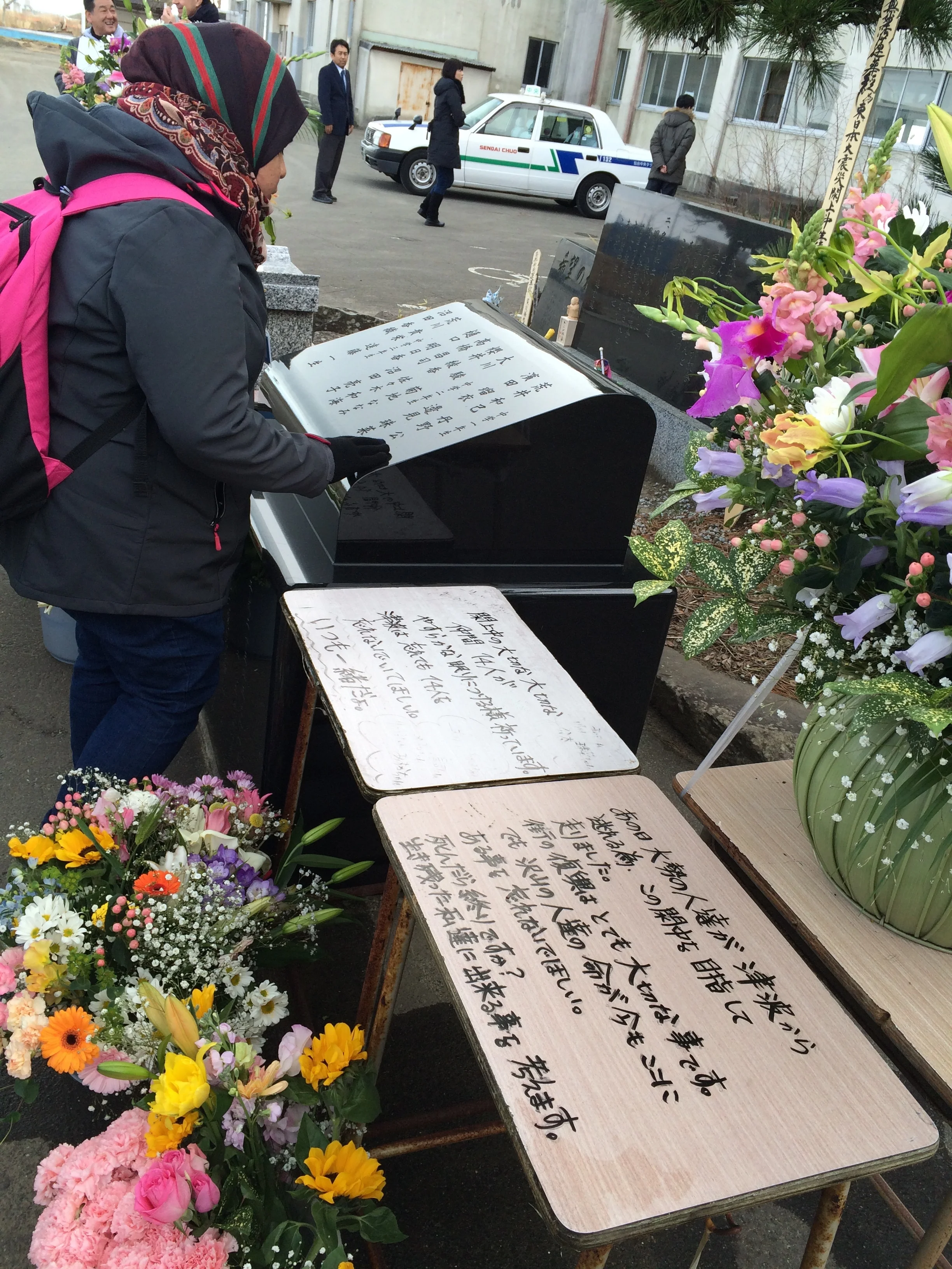 Figure 7: Memorial outside Yuriage Junior High School with the names of the 14 students who died.