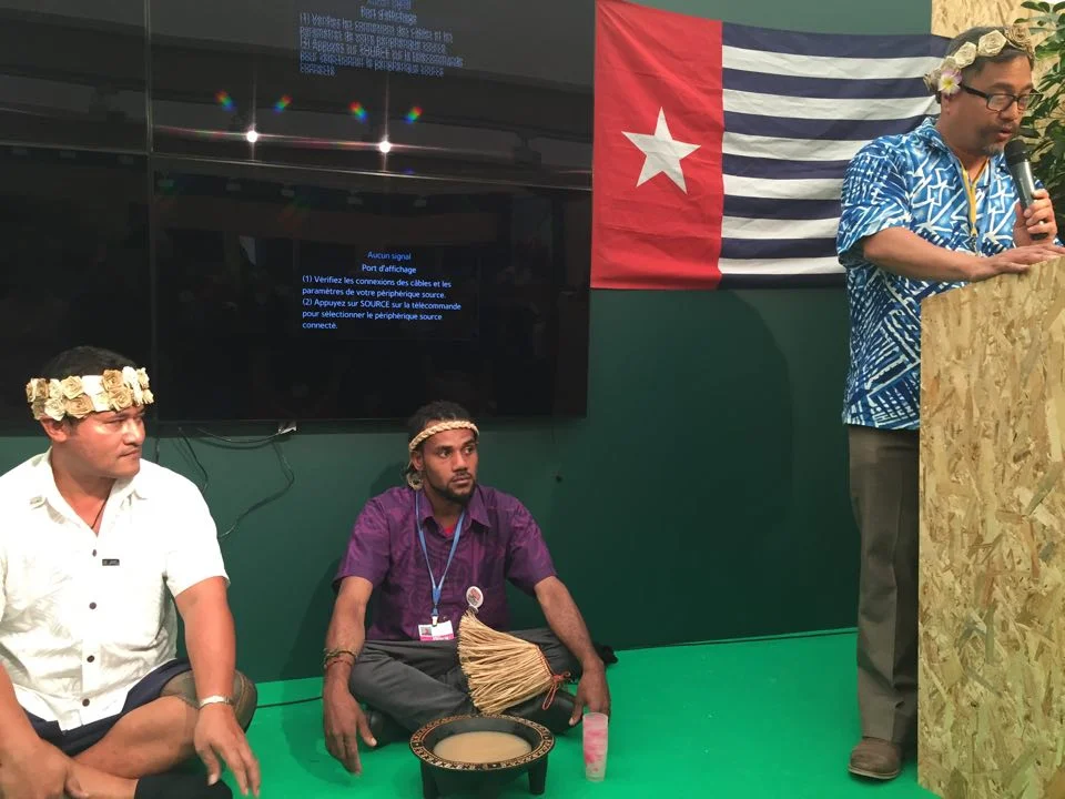 Members of the Pasifika Indigenous Delegation to COP21 open Pacific Day with an Ava ceremony.
