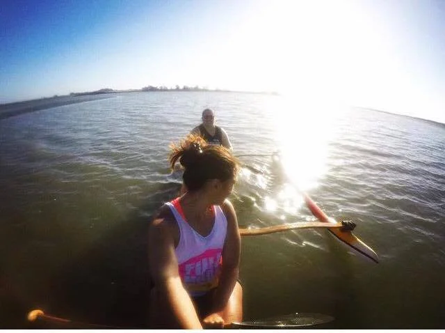 Paddling on the waka in the Manukau Harbour, Tamaki Makaurau, Aotearoa. 