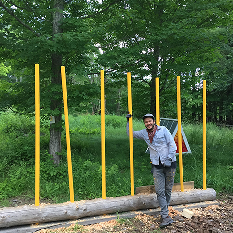 Salvador posing with a budding Exchange Tree.
