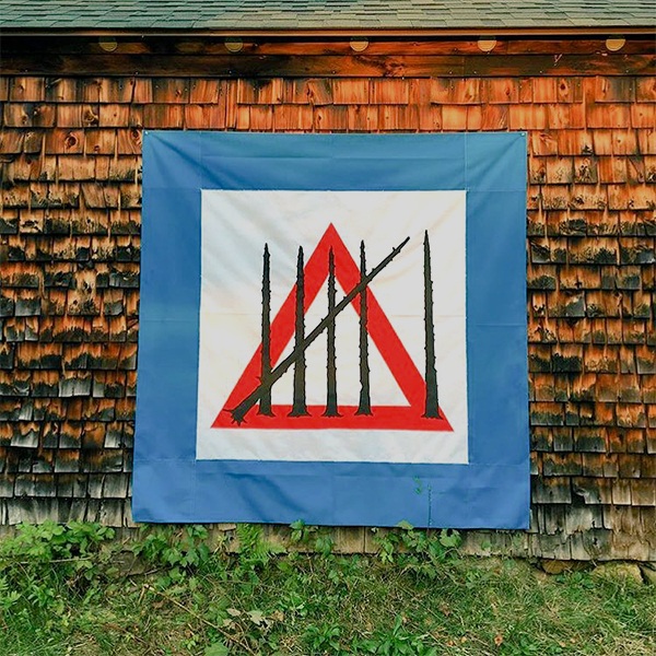 “Sixth Extinction Flag,” installation at Harvard Forest, 5 x 5 feet, marine-grade canvas, 2017. Collaborators: Jackie Barry and Aaron Ellison