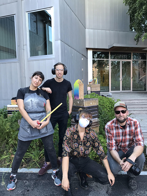 Sasaki on-site installation crew taking a break for the flash bulbs.
