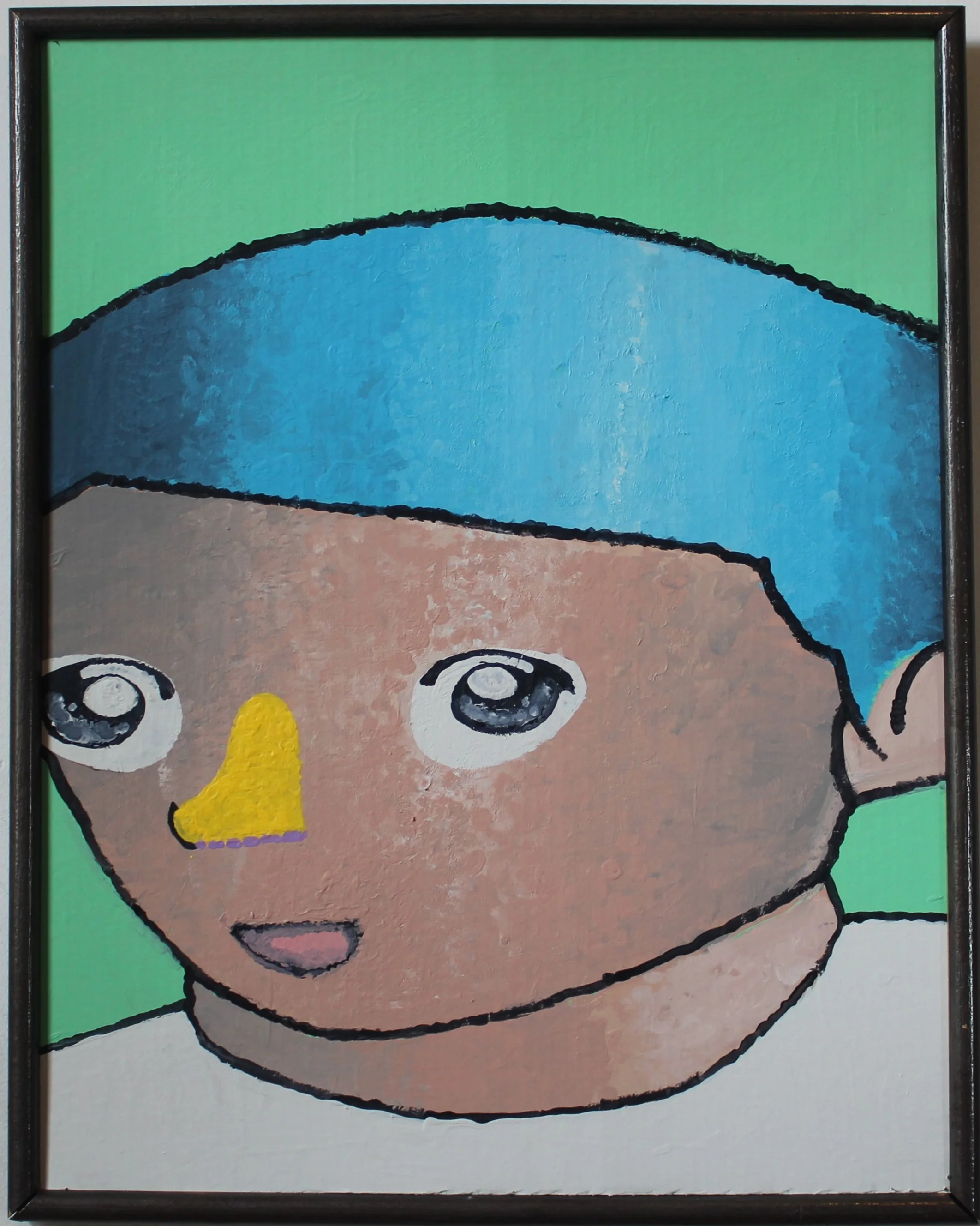 a boy w/ yellow nose