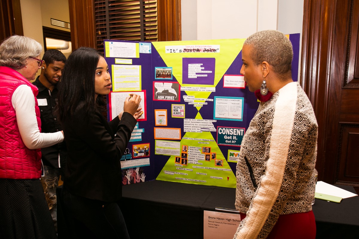 A high school student from Mott Hall V in the Bronx presents her group's project to Laurie Cumbo, NYC Council Majority Leader, as part of Generation Citizenâs Civics Day. Photo credit: Christine Jean Chambers.