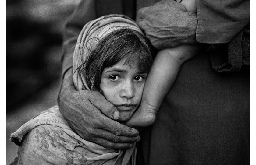 RefugeeGirlandHerFather.jpg
